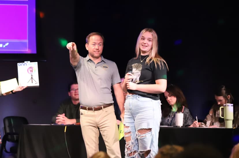 Student founder on stage